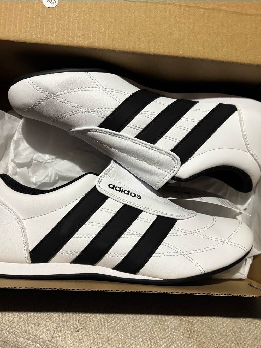 adidas Women’s White Sneakers with Black Three-Stripes